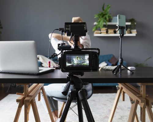 woman-making-beauty-vlog-with-her-professional-camera